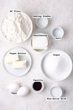 ingredients to make vegan cheesecake on a white countertop with text overlay