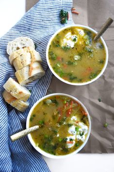 two bowls of roasted garlic chicken bone broth soup on a blue and white towel