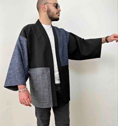 "This streetwear-style patchwork jacket is perfect for spring or fall. Japanese loose-style haori cardigan is made from black and indigo blue-gray charcoal pattern linen cotton fabric. It has wide sleeves. The unisex kimono jacket is of a loose fit, we recommend choosing the size you usually wear. The fabric is one of the more popular choices, as it's a breathable and natural fabric that stays cool. Three pieces of (black and indigo blue, gray charcoal pattern) fabric are sewn together with a pa Kimono Jacket For Men, Men Japanese Style, Traditional Yukata, Fall Patchwork, Gender Neutral Clothing, Japanese Mens Fashion, Neutral Clothing, Japanese Jacket, Jacket Streetwear