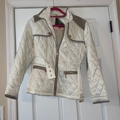 Vince Camuto Riding Jacket Two Front Zippered Pockets Zipper Closure With Functional Belt Slight Marking On Back (See Photo) Suede Shoulder Pads Off White Jacket W/ Gold Accents Bin8 Off White Jacket, Riding Jacket, White Jacket, Cream And Gold, Vince Camuto, Gold Accents, Shoulder Pads, Front Zipper, Jackets & Coats