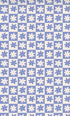 a blue and white checkerboard pattern with flowers on the side, as if it is