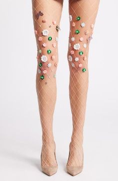 Shimmering flower appliqués alight with lustrous baubles bring showstopping allure to these fishnet tights that add a playful finish to night-out looks. Nylon/spandex Hand wash, dry flat Imported Colorful Tights, Funky Tights, Contemporary Accessories, Colored Tights, Lace Vintage, Fishnet Tights, Fashion Tights, Womens Tights