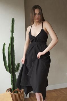 Our stylish, must-have version of the essential LBD (little ​beach dress), the Sage maxi is a flowing asymmetric dream that’s perfect for mid-summer events, beach days, and travel. The silhouette is inspired by the tranquil vibes of Tulum’s beaches and bustling energy of its town center. It features long straps you can wrap twice around the waist for an adjustable fit. Breathable fibers keep you cool as you lounge, explore, and indulge all summer long. Elegant Beach Sundress With Tie Back, Elegant Tie-back Sundress For The Beach, Summer Party Breezy Maxi Dress, Breezy Summer Party Maxi Dress, Chic Sundress For Beach Party, Chic Midi Sundress For Beach Party, Chic Asymmetrical Summer Dress, Chic Summer Asymmetrical Dress, Elegant Summer Midi Dress For Beach Cover-up