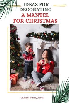 a woman and her child sitting in front of a christmas tree