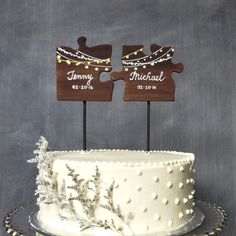 a wedding cake with two pieces missing from it and the top is white frosting