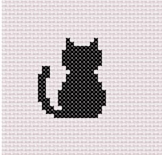 a cross stitch pattern with a black cat