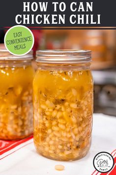 two jars filled with food sitting on top of a table