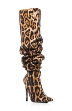 A jewel-encrusted upper and slouchy shaft create visual intrigue on a showstopping boot balanced by a pointy toe and stiletto heel. Pull-on style Synthetic upper, lining and sole Imported Asian & Pacific Islander Owned/Founded Black Dress Leopard Heels, Bad Shoes, Corset Blazer, Snake Skin Boots, Wild Thoughts, Cheetah Print Heels, Leopard Print Boots, Leopard Boots, Print Boots