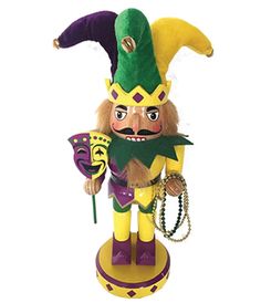 a colorful figurine with a mardi gras costume