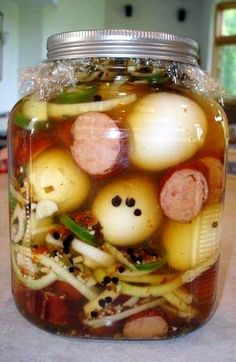 a jar filled with food sitting on top of a counter