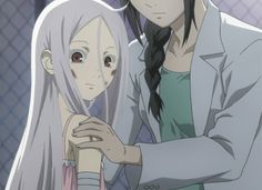 an anime scene with two people standing next to each other and one is holding the head of another person