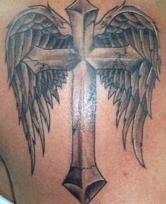 a cross with wings on the back of it