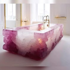 a bathtub in the middle of a white room