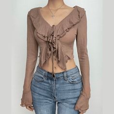 Please refer to our sizing chart for a guideline when choosing a size. 5 business days order processing time. 90% polyester 10% spandex. Trendy V-neck Crop Top For Fall, Elegant V-neck Crop Top For Fall, Casual V-neck Crop Top With Ruffles, Casual V-neck Ruffled Crop Top, Trendy Ruffled Stretch Crop Top, Trendy Stretch Crop Top With Ruffles, Fitted V-neck Crop Top With Ruffles, Fitted V-neck Ruffle Crop Top, Fall Trendy V-neck Crop Top