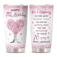 two pink tumblers with the words happy 70th birthday on them