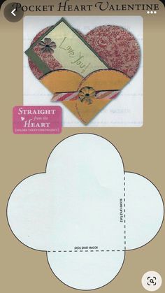 an envelope with a heart shaped paper cut out into it's side and attached to the