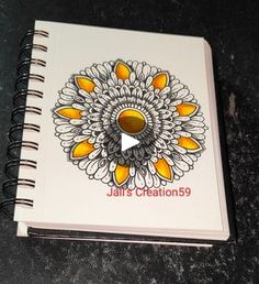 a spiral notebook with an image of a flower on the front cover and title that reads, jahre creations?