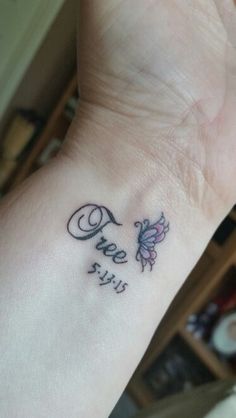 a woman's wrist tattoo with the word hope written in cursive letters