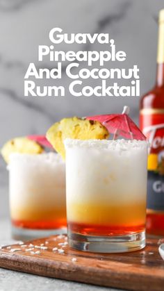 two glasses filled with rum, pineapple and coconut rum cocktail on a cutting board