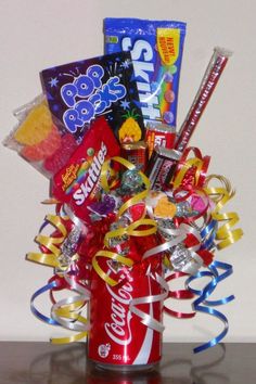 a can filled with assorted candy and candies