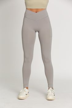 Elevate your activewear with our Grey Mist Seamless Crossover Leggings. The unique, seamless crossover design at the waistband provides a flattering silhouette, highlighting your curves and offering gentle compression for a supportive feel throughout your workout or daily activities. Amazon Account, Crossover Leggings, Athletic Clothes, Tennis Skirts, Athletic Top, Yoga Tops, Athletic Outfits, Daily Activities, Model Height