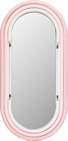 a pink mirror sitting on top of a white wall