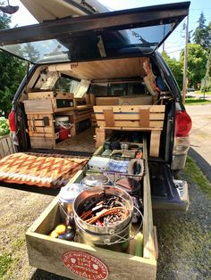 the back end of a van with food in it