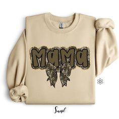 Such a cute camo mama tee! These are great for fall & hunting season of course. DTF printed on comfort colors tee.  🧼 Care Instructions: Wash inside out in cold water on a delicate cycle. Avoid bleach. Hang dry or lay flat for best print preservation. 📦 Shipping and Handling: Processing: Ready to ship within 1 week. 🌟 Thank You! Thank you for supporting our small business! Camouflage T-shirt For Fall, Fall Camouflage Tops With Graphic Print, Fall Hunting, Cute Maternity Shirts, Mama Crewneck, Mama Tee, Hunting Season, Comfort Colors Tee, Mom Tees