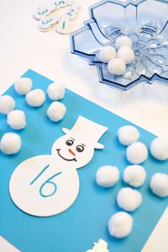 the snowman is made out of foam balls and plastic beads, along with other crafting supplies