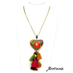 Hand painted heart Necklace. Hand painted by artisans in Chiapas Mexico, this lovely necklaces are decorated with wooden hearts and many bead strands to give the ethnic a more modern look. Adjustable height so you can wear it close to the neck or way below. Dimesions: 22 inches long. Multicolor Heart Beads Jewelry For Festival, Festival Multicolor Heart Beads Jewelry, Handmade Multicolor Necklace Souvenir, Traditional Multicolor Heart Beads Necklace, Multicolor Bohemian Jewelry With Heart Beads, Traditional Multicolor Jewelry With Heart Beads, Bohemian Heart Charm Necklace For Festivals, Multicolor Heart Beads Necklace For Festivals, Multicolor Beaded Heart Pendant Necklace