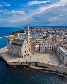 an aerial view of the old city and its surrounding waterfront area, taken from above