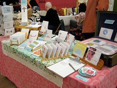 a table with many cards and papers on it