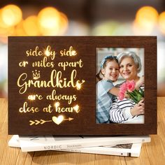 PRICES MAY VARY. 🎁UNIQUE MOTHERS DAY GIFTS FOR GRANDMA: Designed with engraved glowing warm words, MAYICIVO Wooden Best Grandma Gifts Glowing Grandma Picture Frame with Night Light is a perfect gifts for grandma, grandpa, nana, grandmother, mimi, gigi from granddaughter grandson grandkids. Showcase your love and appreciation in a unique and eye-catching way with this warm night light that combines heartfelt words and a cherished photo, making it a meaningful nana gifts grandma birthday gifts gr Grandma Frame, Gifts For Nana, Grandma Picture Frame, Nana Christmas, Grandpa Christmas Gifts, Nana Christmas Gifts, Grandma Photos, Gifts Grandma, Gigi Gift