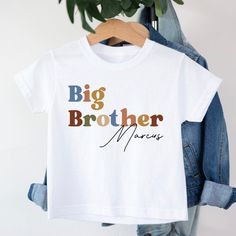 Personalised Big Brother t-shirt T-shirt is 100% Australian cotton.  We design & print our products with care & love! We use the best quality vinyls, inks & transfers on all products. * * * * * * * * * * * * * * * * * * * * * * * * * * * * * CARE INSTRUCTIONS: Wash inside out on gentle wash, Do not tumble dry. * * * * * * * * * * * * * * * * * * * * * * * * * * * * * SHIPPING: We want to get your product to you as quickly as possible, your purchase will be shipped through Australia post, Express post is available for selection. * * * * * * * * * * * * * * * * * * * * * * * * * * * * * GUARANTEE: We stand behind our products with a 100% guarantee; if you are unsatisfied with our product, please let us know & we will rectify any issues. We are unable to refund products due to change of mind White Custom Print Family Matching T-shirt, White Custom Print Family T-shirt, Unisex White T-shirt With Letter Print, White Print Name T-shirt In Cotton, White Short Sleeve T-shirt For Gender Reveal, White Print Name Cotton T-shirt, White Name Print Cotton T-shirt, White Cotton T-shirt With Name Print, Short Sleeve T-shirt With Name Print For Gender Reveal