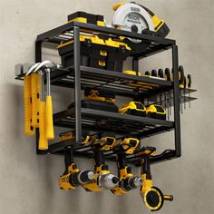 a wall mounted tool rack with tools on it