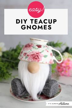 an easy diy teacup gnome sitting on top of a saucer with flowers