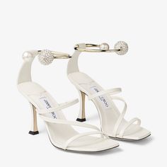 Ottilia 90 | Latte Nappa Leather Sandals with Crystal and Pearl Strap | JIMMY CHOO Jimmy Choo Pearl Heels, Sneaker Dress Shoes, Wedding Heels, Ankle Bracelet, Jimmy Choo Shoes, Pump Sandals, Ankle Bracelets, Nappa Leather, Bridal Shoes