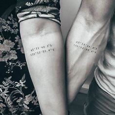 two people with matching tattoos on their arms, one has the word love written in cursive writing