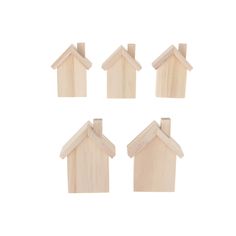 small wooden houses are shown on a white background