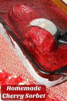 homemade cherry sorbet in a baking dish on a table with the words homemade cherry sorbet above it