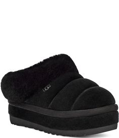 From UGG &#x2C; the Tazzlita Suede Fur Collar Platform Clog Slippers feature:Suede upperTopically applied water repellency treatmentSheepskin collarRecycled polyester bindingHeat-embossed UGG  logoSlip on10mm UGGplush  60% upcycled wool&#x2C; 40% lyocell vamp lining17mm UGGplush  60% upcycled wool&#x2C; 40% lyocell socklinerEVA midsole&#x2C; Suede-wrapped midsoleEVA outsole or SugarSole  EVA outsoleApprox. 1.75" platform heightImported.&#042 Black Platform Slippers, Platform Uggs, Clog Slippers, Platform Clogs, Real Fur, Fit Check, Fashion Editor, Dillard's, Fur Collar