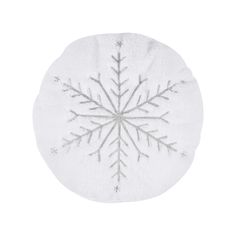 a white snowflake ornament on a white background