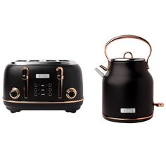 two black and gold toasters sitting next to each other on a white background,