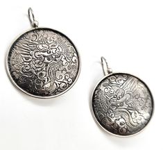 Silpada Chinese Dragon Asian tribal large shield signed sterling silver earrings. Good used condition with little signs of normal wear. These unique rare Silpada earrings are stamped on the back with the Silpada hallmark and 925. Acid tests positive for sterling silver. Earrings measure 1 and 3/4ths of an inch tall and 1 and 1/4 of an inch across. Silpada Earrings, Chinese Dragon, Sterling Silver Earrings, Hallmark, Silver Earrings, Sterling Silver, Signs, Silver