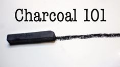 the word charcoal 101 written on a piece of paper with a black crayon pencil