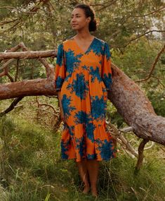 VIBRANT PRINT ; The new Masai nette dress with a beautiful print mix of burnt orange and teal is an excellent addition to your summer dress collection. A medium in this style will suit size 12 to 14. Available at Ninas Boutique https://www.ninasboutique.ie/collections/masai/products/1009264-russ-orange-nette-dress-masai #masai #SummerDresses Work Dinner, Deep Orange, Short Coat Jackets, Feminine Silhouette, Orange Background, Layered Skirt, Summer Staples, Cut It, Mixing Prints