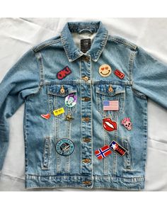 a denim jacket with patches on it