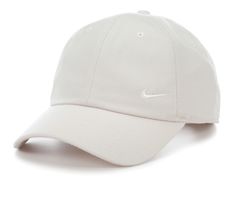 Keep it simple and stylish with the Nike Club Cap Swoosh. Designed for everyday wear, this classic cap features the iconic Nike Swoosh logo for a touch of athletic flair. One size fits most, Hook-and-loop closure is easy to adjust for a fit that feels just right, Eyelets help airflow so you stay cool, Nike Dri-FIT technology moves sweat away from your skin for quicker evaporation, helping you stay dry and comfortable, Body: 100% polyester. Sweatband: 91% polyester/ 9% spandex, Clean with Damp Cl Classic Sports Dad Hat, Nike Sporty Dad Hat With Curved Bill, Classic Sports Visor Dad Hat, Classic Dad Hat Baseball Cap For Sports, Classic Dad Hat For Sports Events, Classic Cream Dad Hat, Classic Sports Dad Hat With Curved Bill, Classic Cream Baseball Cap With Curved Visor, Classic Nike Baseball Cap For Sports