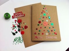 two christmas cards with buttons and sprinkles on them next to a green ribbon