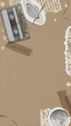 an old fashioned tape recorder surrounded by papers and other things on the ground, with words that read love yourself